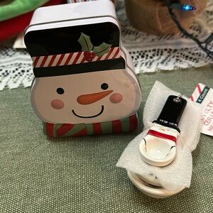 Set of snowman tin and snowman ceramic measuring spoons